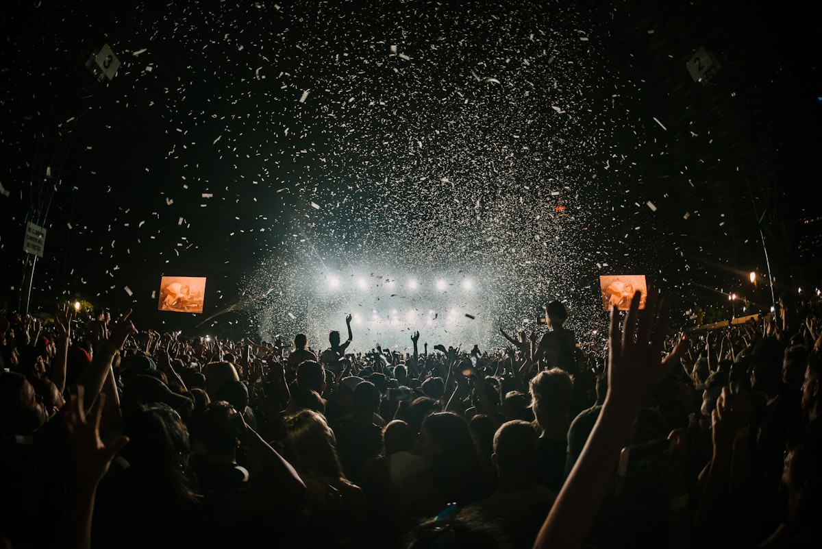 Live event crowd under stage lights