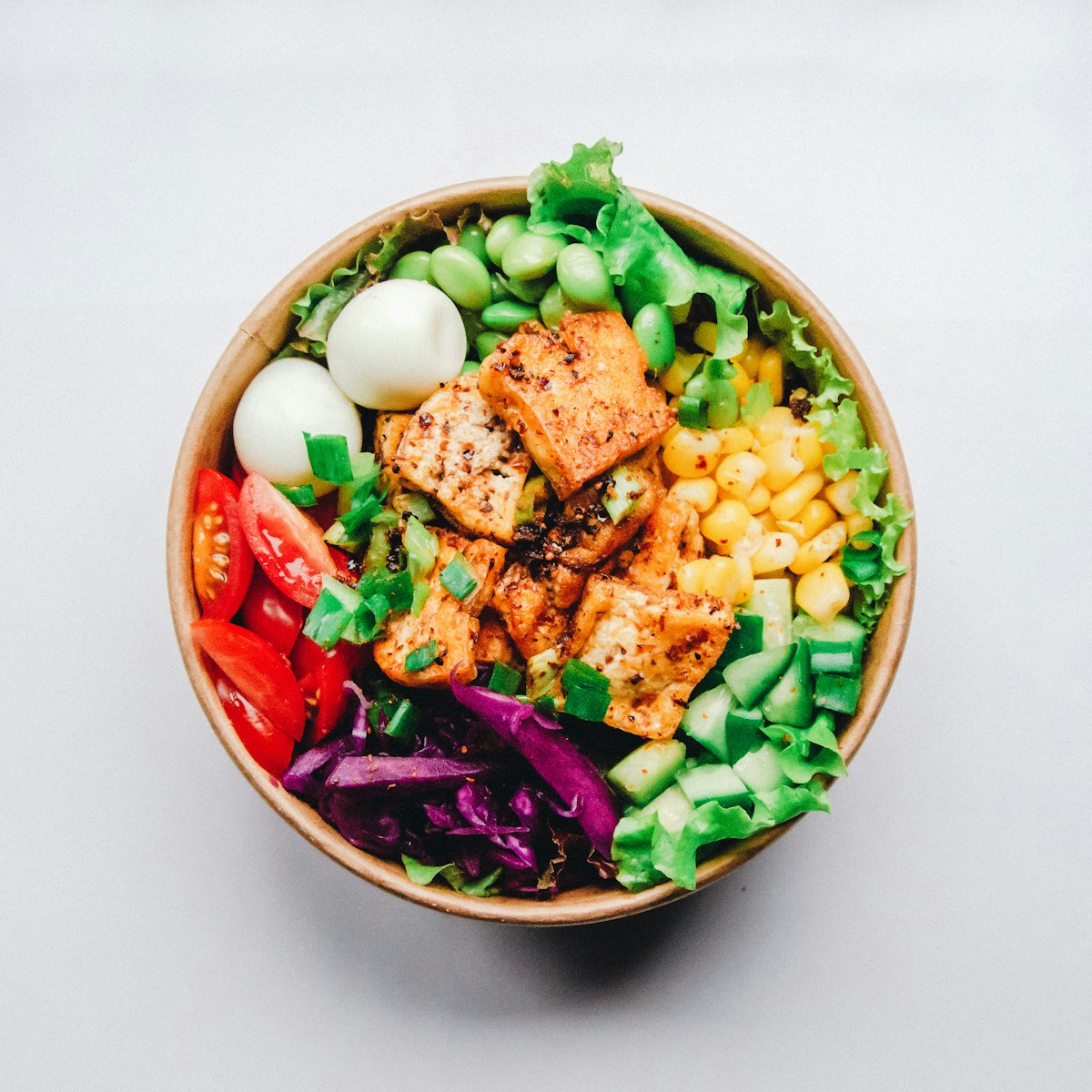 Salmon grain bowl in warm natural light