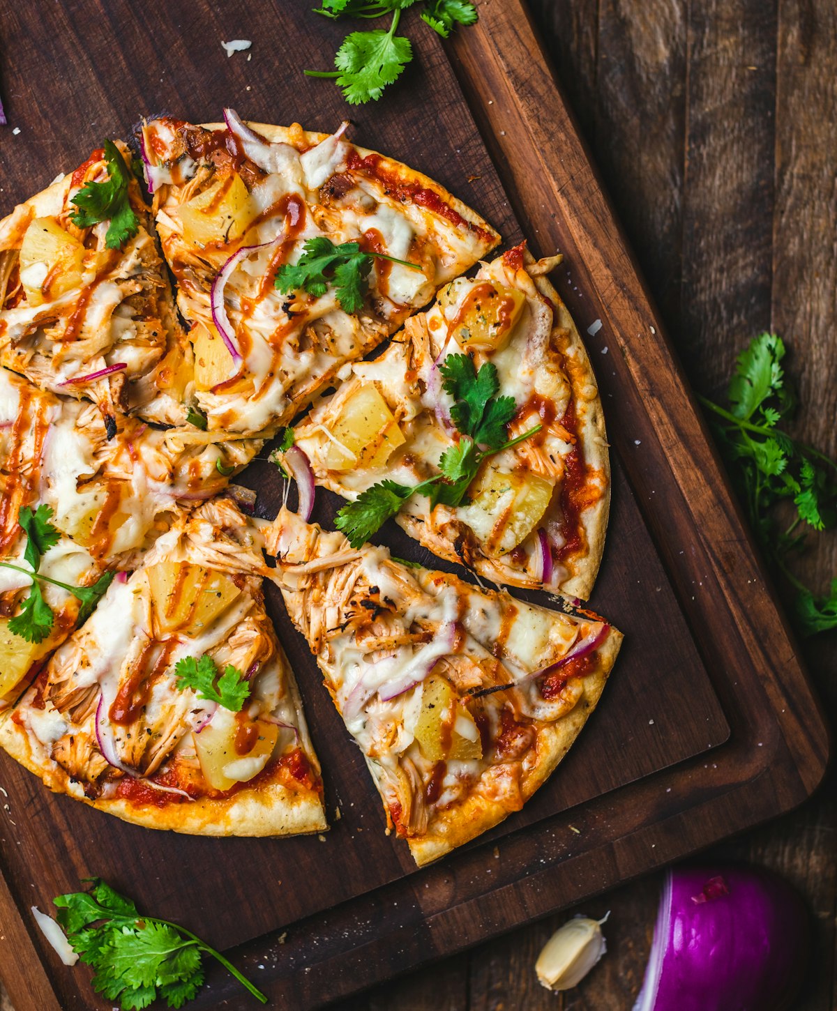Wood-fired pizza on a rustic board