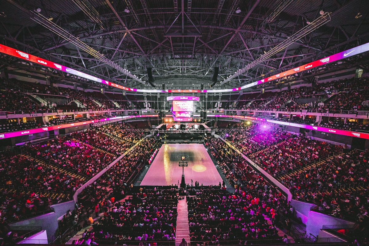 Packed arena lit in team colors